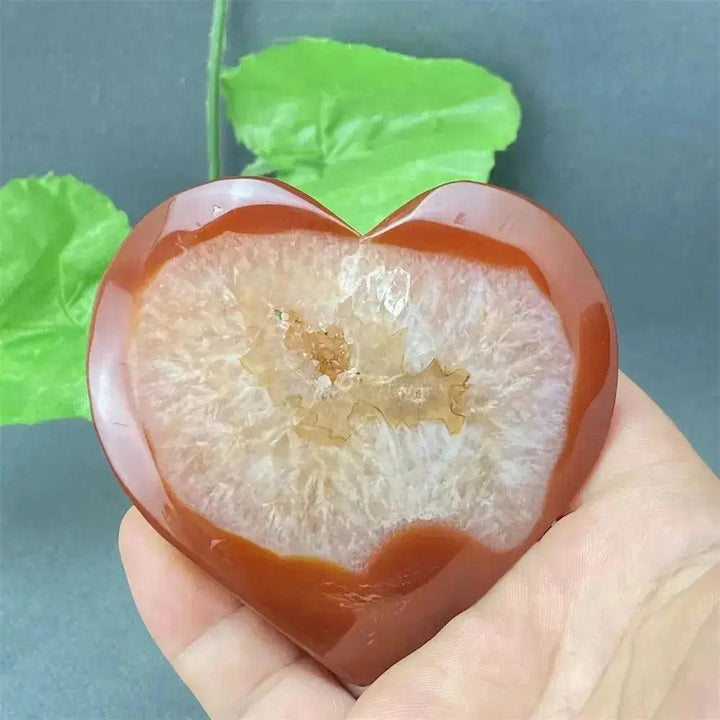 Natural Red Agate Heart Geode with sparkling druzy crystals, promoting strength and emotional balance.