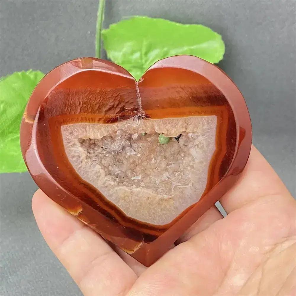 Natural Red Agate Heart Geode with sparkling druzy crystals, promoting strength and emotional balance.