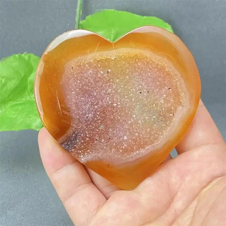 Natural Red Agate Heart Geode with sparkling druzy crystals, promoting strength and emotional balance.