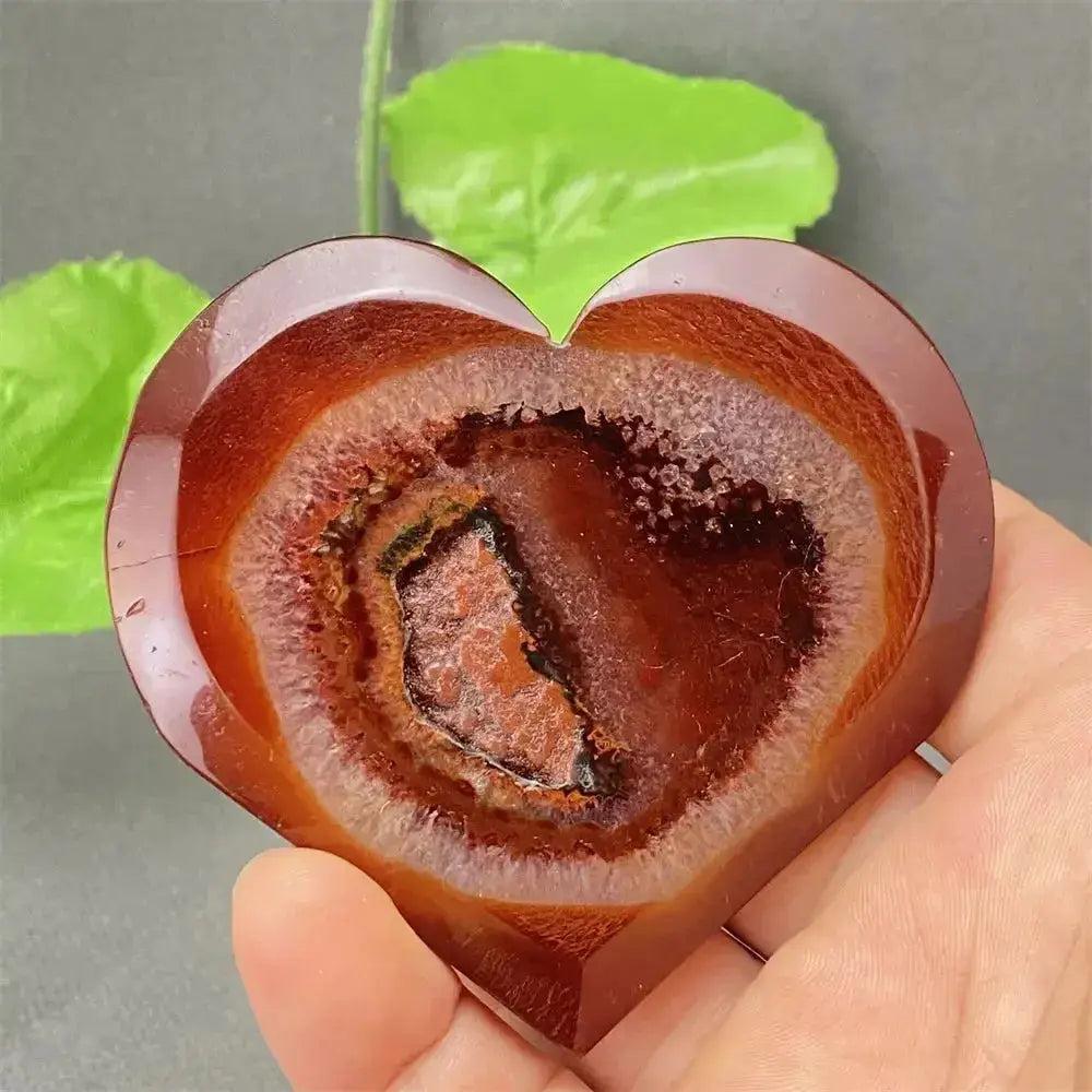 Natural Red Agate Heart Geode with sparkling druzy crystals, polished exterior, and grounding energy.