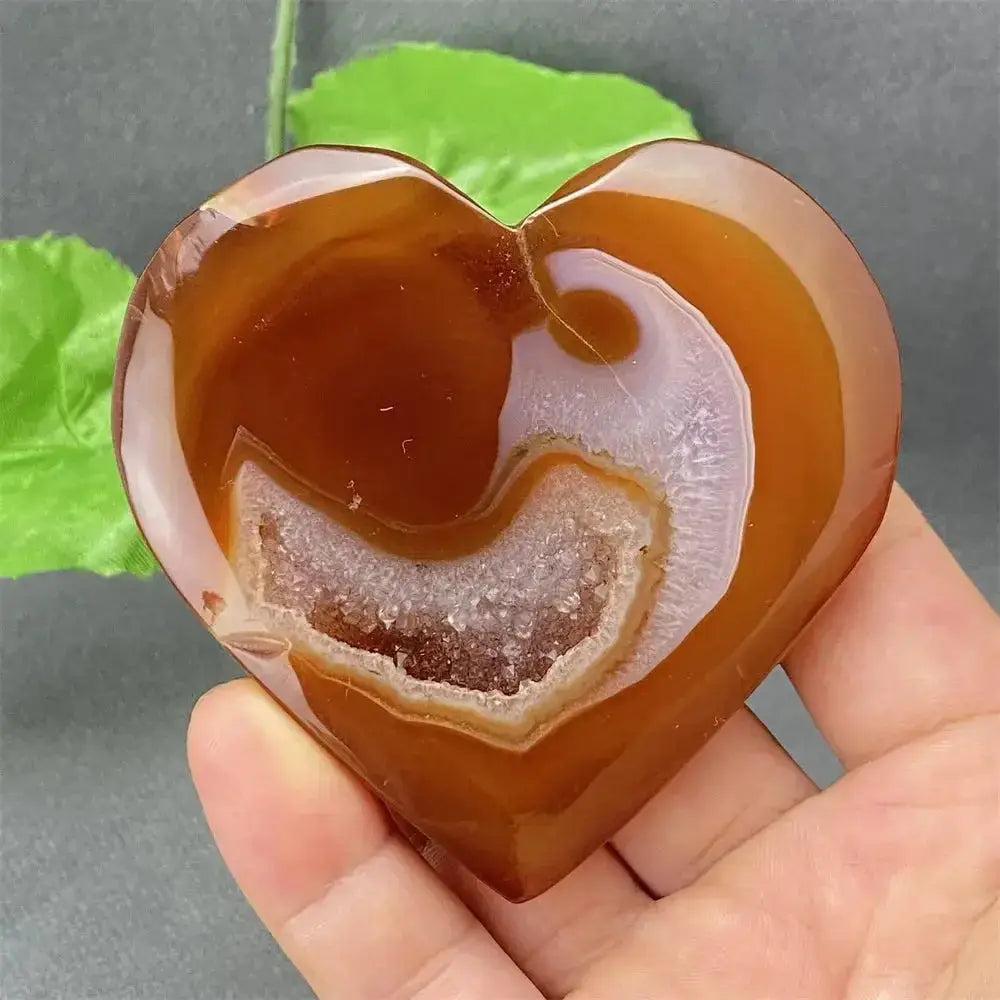 Natural Red Agate Heart Geode with sparkling druzy crystals, offering grounding energy and emotional balance.