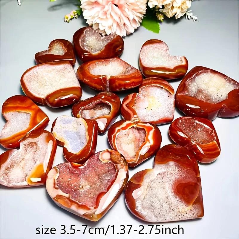 Heart-shaped natural red agate crystal stones with sparkling druzy centers for healing and love.