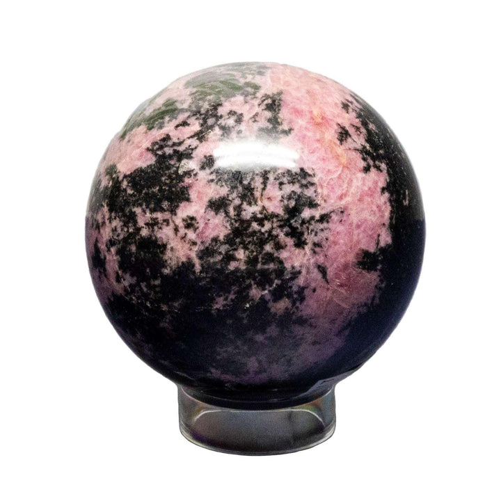 Polished Rhodonite Sphere, deep rose pink with black manganese veins, for emotional healing and unique display.