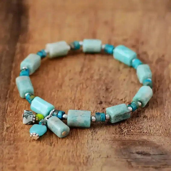 Amazonite Beaded Stretch Bracelet: Calming blue-green gemstone beads, silver accents, and charm for courage and truth.