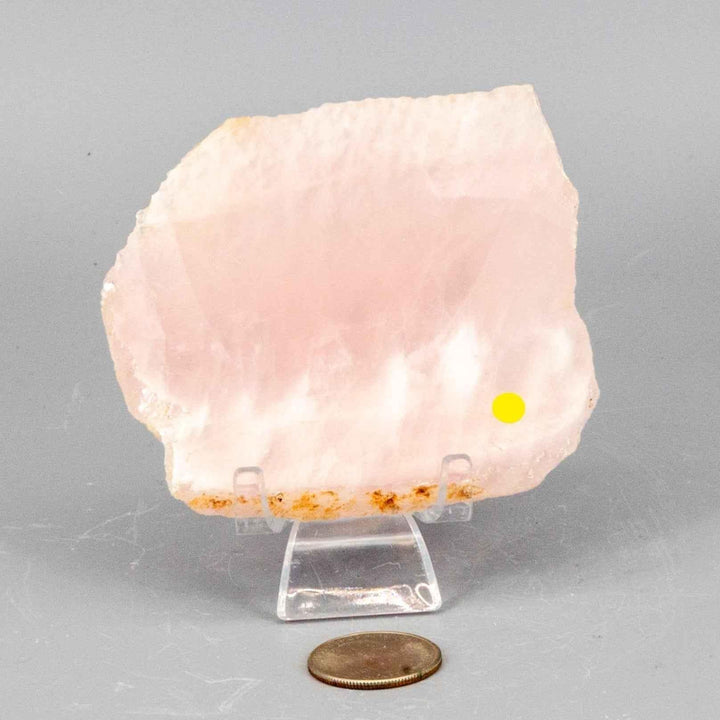 Rose Quartz Slice: Polished, translucent pink crystal with natural edges, perfect for display and gentle glow.