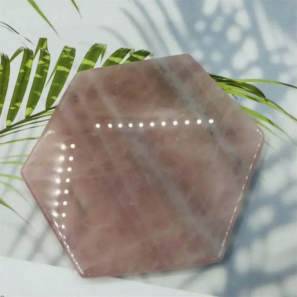 Polished Rose Quartz hexagon coaster from Crystal Destiny, showcasing its soft pink hues and loving energy.