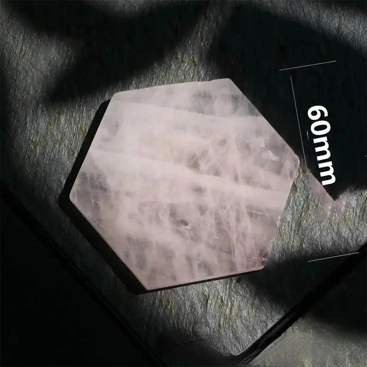 Crystal Destiny's 60mm polished Rose Quartz hexagon coaster, showcasing its soft pink hue and loving energy.