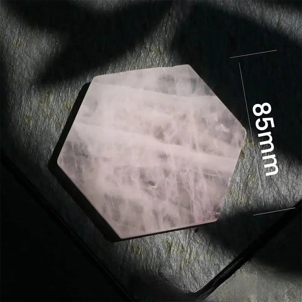 Polished 85mm Rose Quartz hexagon coaster from Crystal Destiny, showcasing its soft pink hues and loving energy.