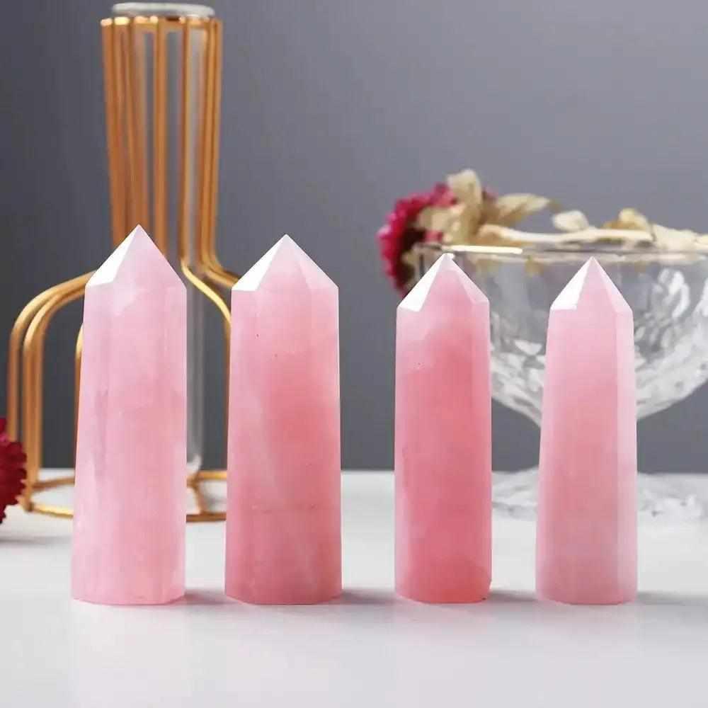 Polished Rose Quartz Hexagonal Crystal Point towers in soft pink for Heart Chakra healing and unconditional love.