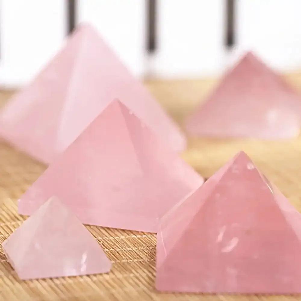 Hand-polished Rose Quartz Mini Pyramids in soft, milky pink for heart chakra healing and intention setting.
