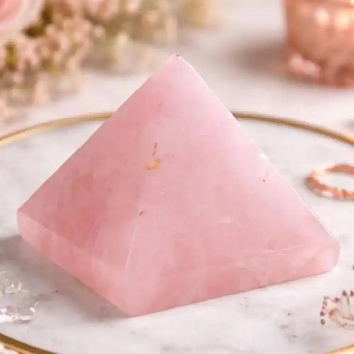 Hand-polished Rose Quartz Mini Pyramid in soft pink, a sacred geometry crystal for heart chakra healing and intention.