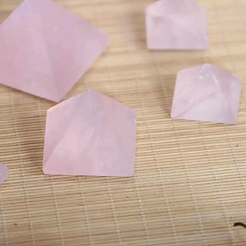 Hand-polished Rose Quartz Mini Pyramids in soft, milky pink for heart chakra healing and intention setting.