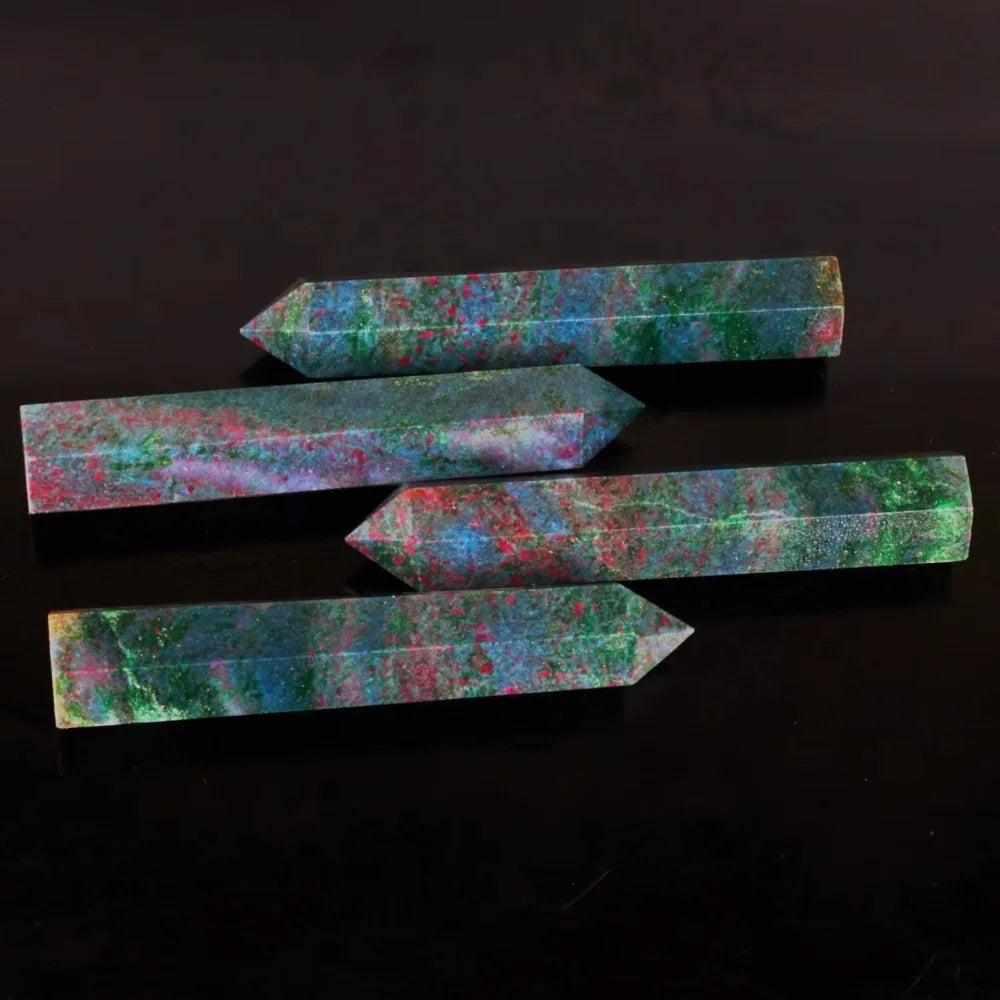 Polished Ruby Kyanite tower points featuring vibrant red and blue minerals for vitality and clear communication.