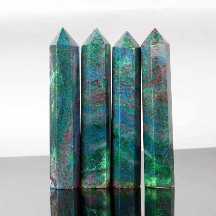 Polished Ruby Kyanite tower point featuring vibrant red ruby inclusions in blue kyanite for vitality and clear communication.