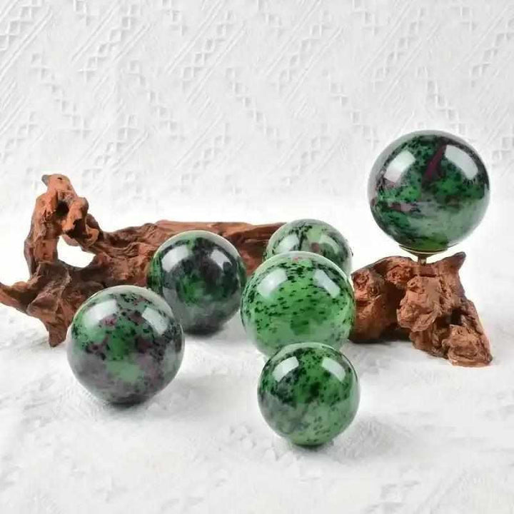 Polished Ruby Zoisite spheres featuring vibrant green and ruby red patterns for heart-centered energy and vitality.