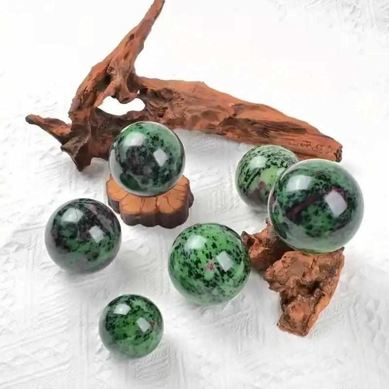 Polished Ruby Zoisite spheres featuring vibrant green, red, and black patterns for heart-centered energy and vitality.