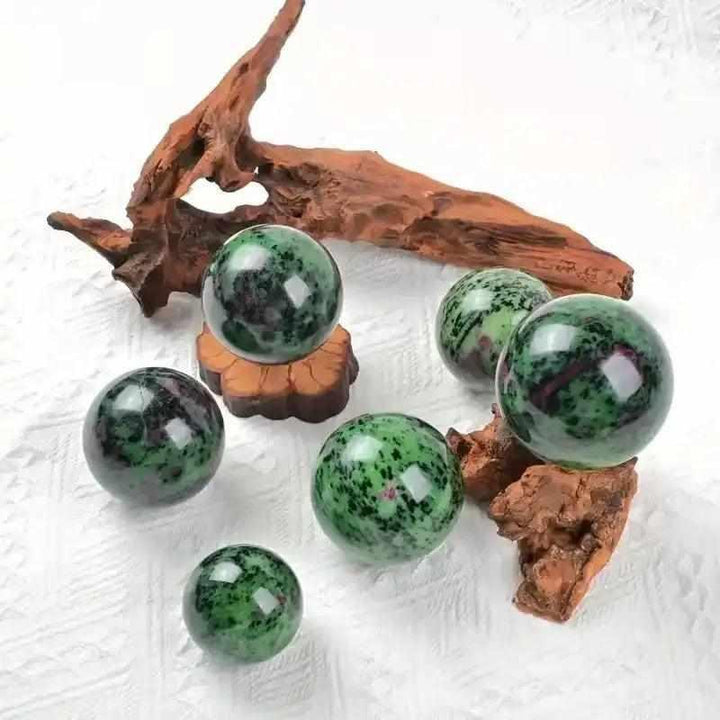 Polished Ruby Zoisite spheres featuring vibrant green, red, and black patterns for heart-centered energy and vitality.