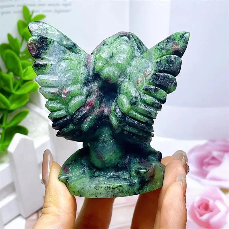 Hand-carved Ruby in Zoisite angel figurine featuring striking forest green and vivid red-pink patterns for heart healing.