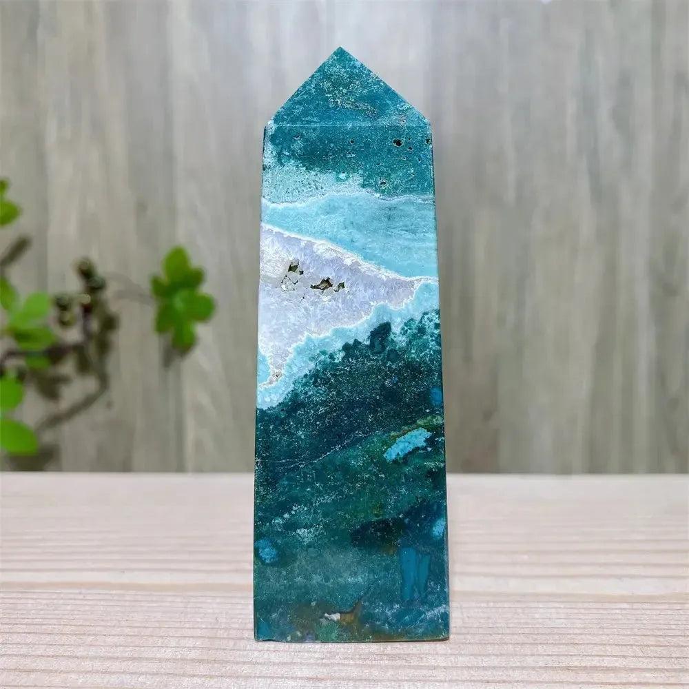 Polished Ocean Jasper tower with swirling blue, green, and white patterns, featuring natural druzy inclusions.