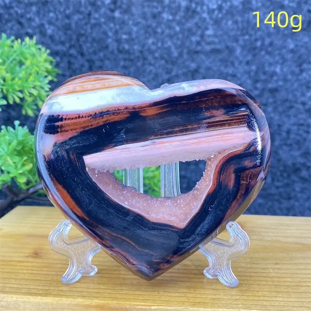 Heart-shaped black and red agate geode with sparkling pink druzy, 140g, for feng shui decor.