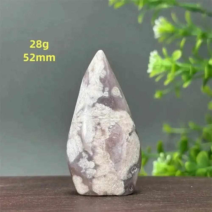 Polished Sakura Agate torch freeform with soft pink and white floral patterns for Heart Chakra healing and self-love.