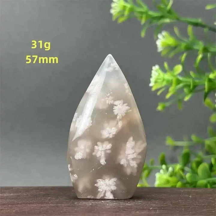 Polished Sakura Agate torch freeform with soft pink and white floral patterns for Heart Chakra healing and emotional renewal.