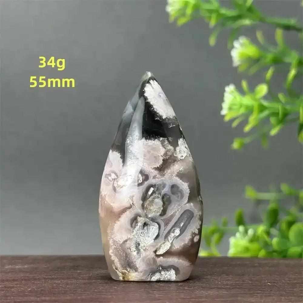 Polished Sakura Agate torch freeform with pink and white floral patterns, 34g and 55mm, for Heart Chakra healing and decor.