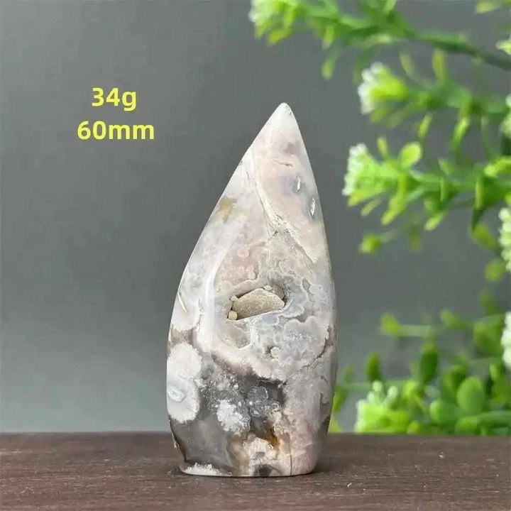 Polished Sakura Agate torch freeform with pink and white cherry blossom patterns, perfect for Heart Chakra healing.