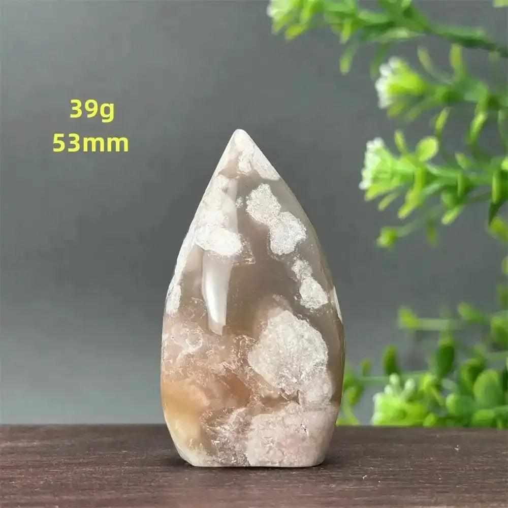 Polished Sakura Agate torch freeform with soft pink and white floral patterns for Heart Chakra healing and self-love.