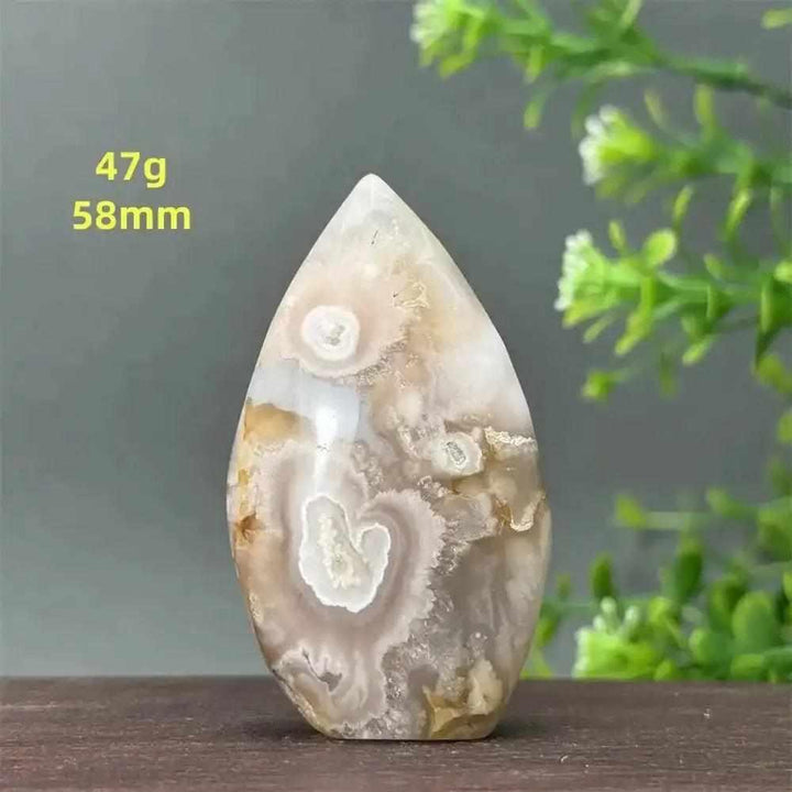 Polished Sakura Agate torch freeform with soft pink floral patterns, 47g and 58mm, for Heart Chakra healing and self-love.