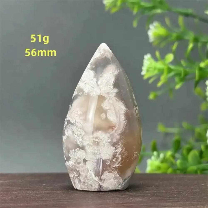 Polished Sakura Agate torch freeform with pink and white cherry blossom patterns, perfect for Heart Chakra healing.