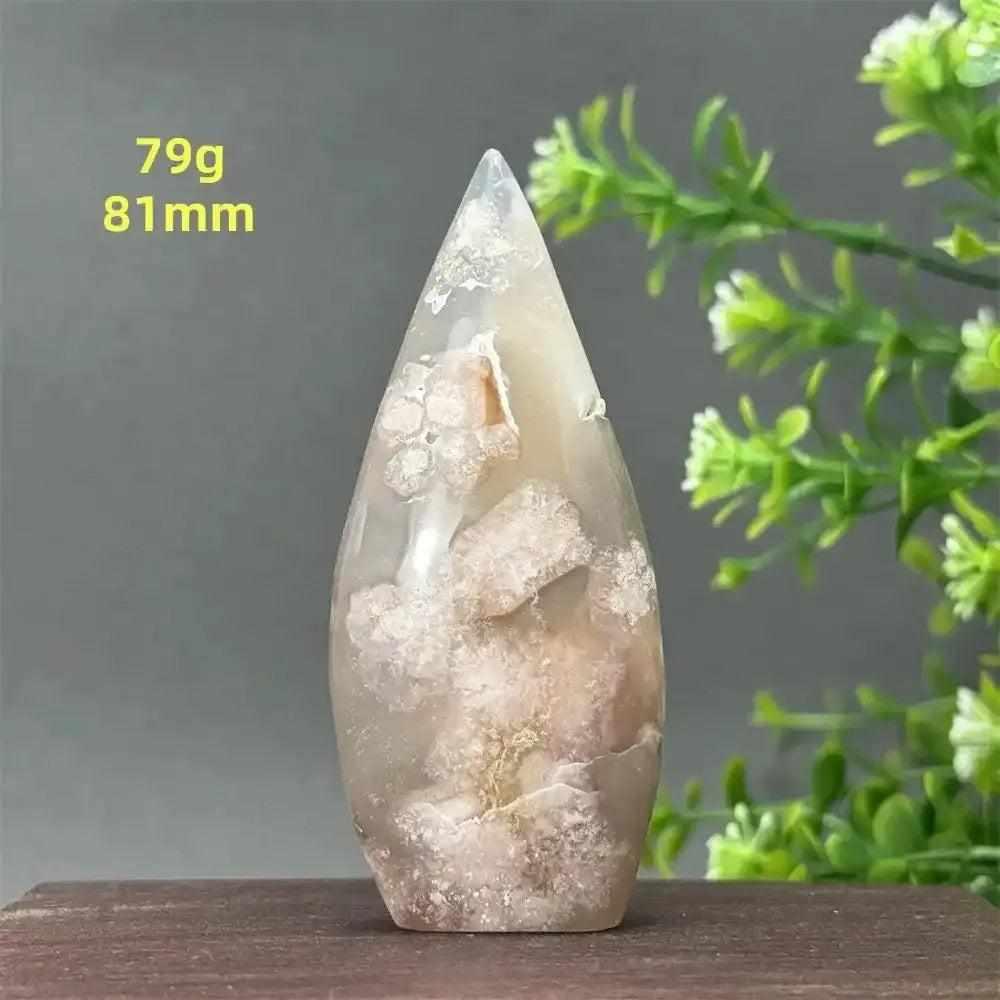 Polished Sakura Agate torch freeform with soft pink cherry blossom patterns, perfect for Heart Chakra healing and decor.