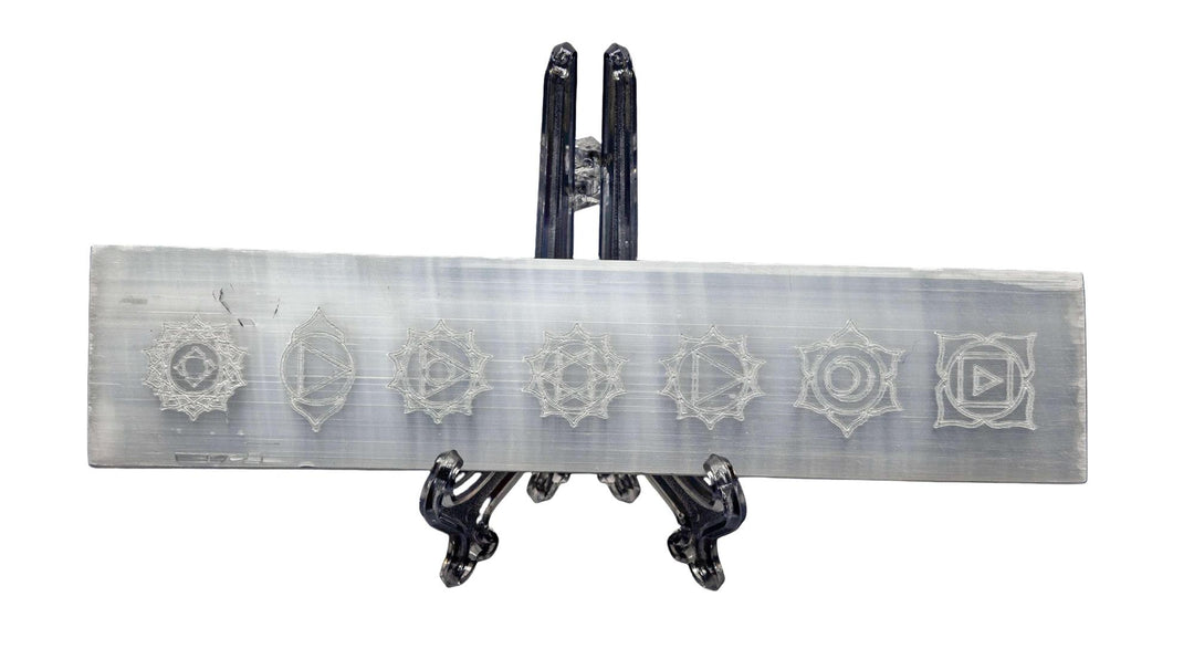 Selenite 7 Chakra Symbol Charging Plate from Crystal Destiny, a rectangular white crystal with etched chakra symbols.
