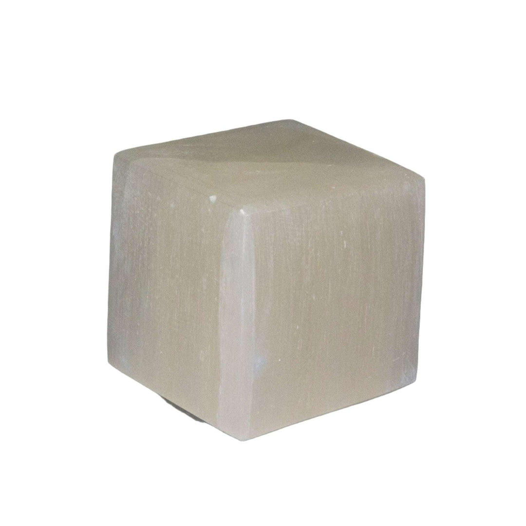 Selenite Cube 2 Inch: A grounding, high-vibration white crystal cube with a silky, pearlescent sheen.