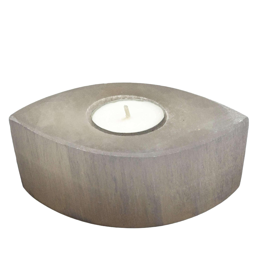 Selenite Oval Tealight Candle Holder: Translucent white selenite stone, oval shape, with a white tealight candle.