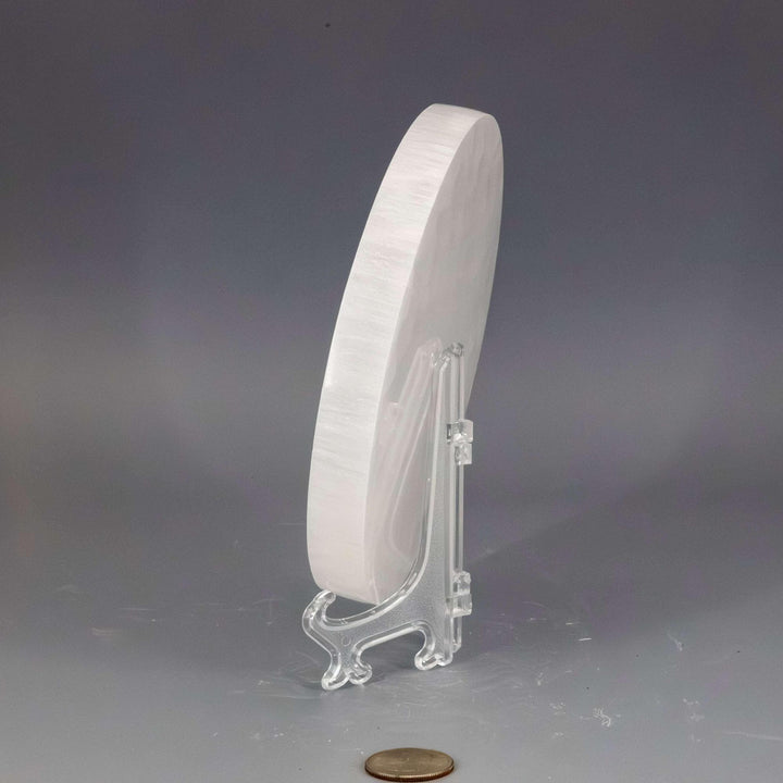 Selenite Crystal Forest Fairy Charging Plate, translucent white with natural striations, for cleansing and recharging.
