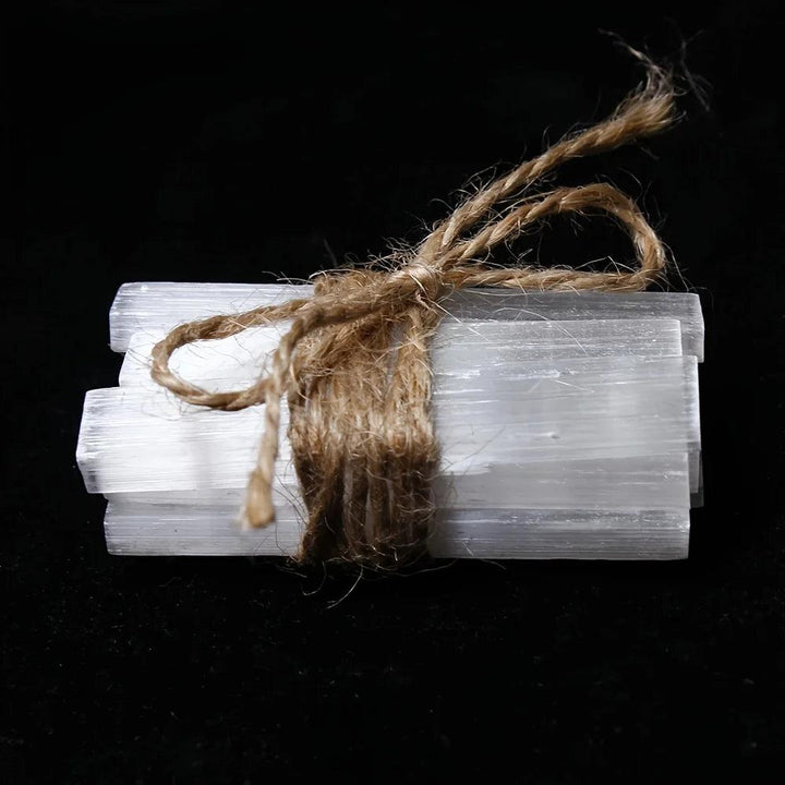 Natural white Selenite Crystal Wands, raw gypsum sticks tied with twine, for cleansing and purification.