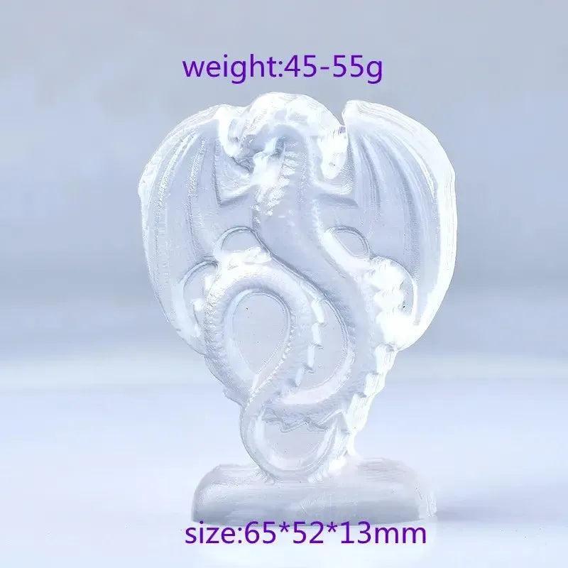 Luminous white selenite fire dragon carving by Crystal Destiny, promoting clarity and protection.