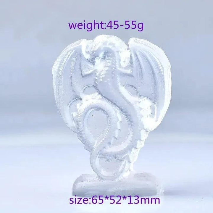 Luminous white selenite fire dragon carving by Crystal Destiny, promoting clarity and protection.