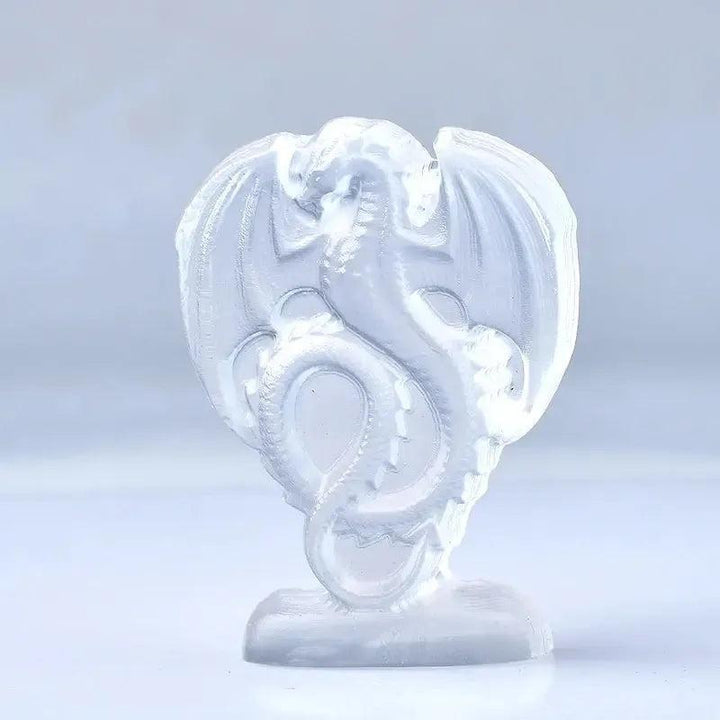 Luminous white selenite fire dragon carving by Crystal Destiny, promoting clarity and protection.