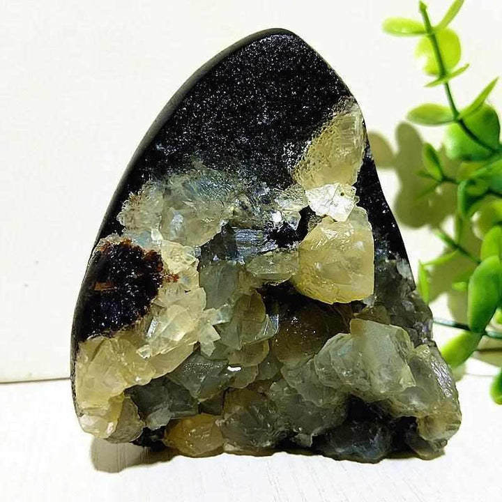 Polished Septarian freeform with yellow calcite and brown aragonite veins, perfect for root chakra grounding.