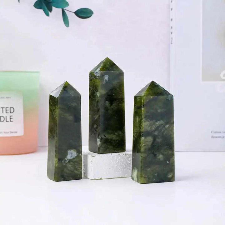 Polished Serpentine Tower Point with mottled olive and deep green tones, perfect for Heart Chakra meditation and decor.