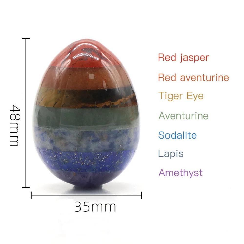 Polished 48mm Seven Chakra Crystal Fused Stone egg, featuring Red Jasper, Tiger Eye, Lapis, and Amethyst.