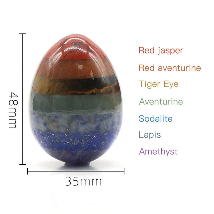Polished 48mm Seven Chakra Crystal Fused Stone egg, featuring Red Jasper, Tiger Eye, Lapis, and Amethyst.