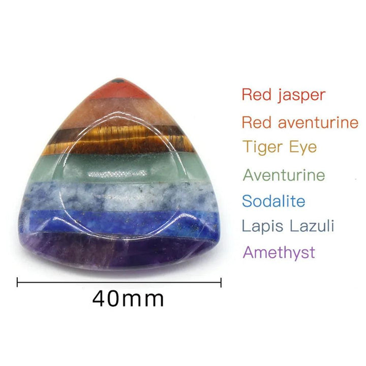 Polished 40mm Seven Chakra Crystal Fused Stone, a rainbow of Red Jasper to Amethyst for energy work.