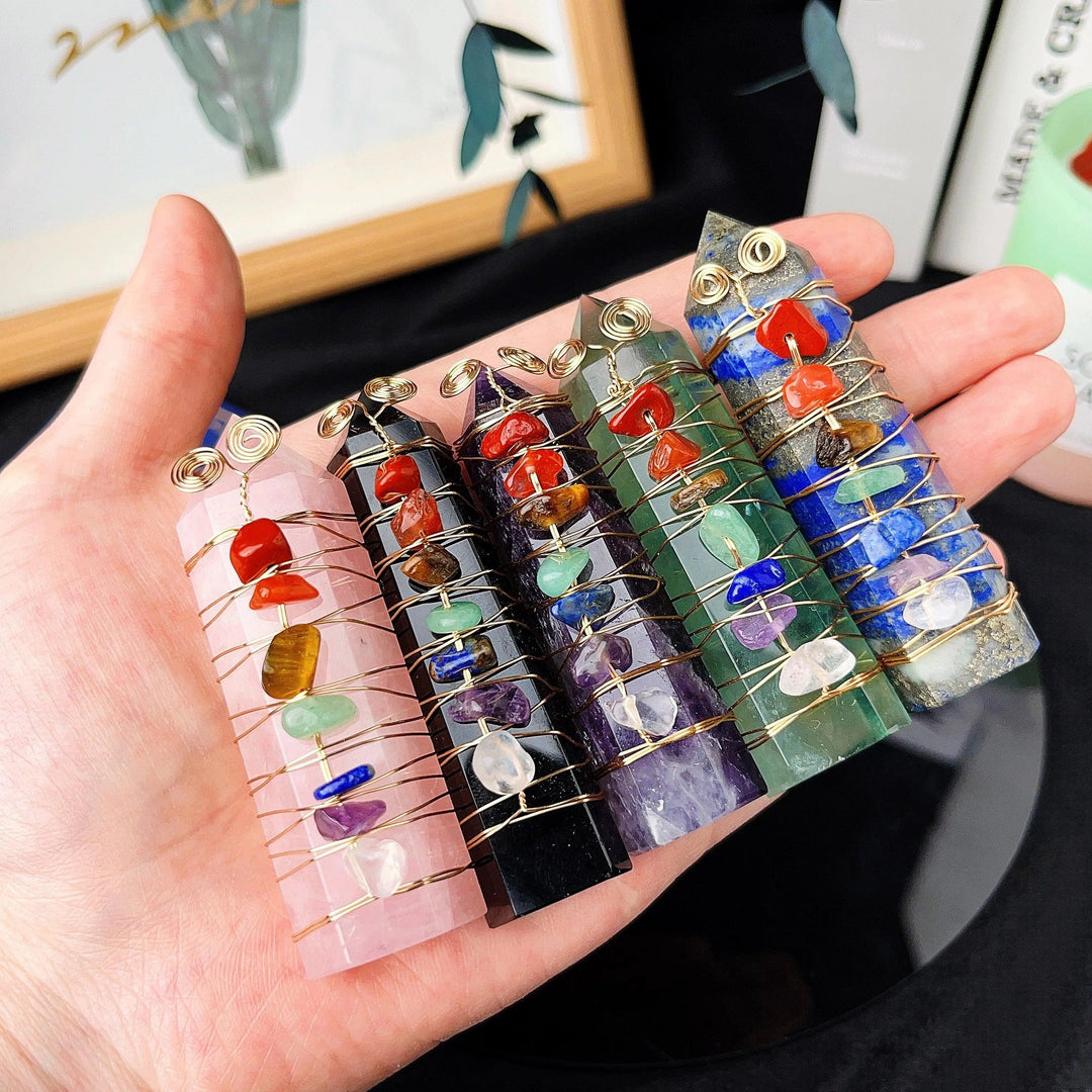 Rose Quartz, Amethyst, and other natural stone chakra crystal towers with copper wire winding.