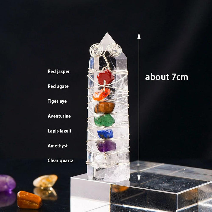 Clear quartz tower with seven chakra crystal chips (red jasper to amethyst) wrapped in silver wire, about 7cm tall.