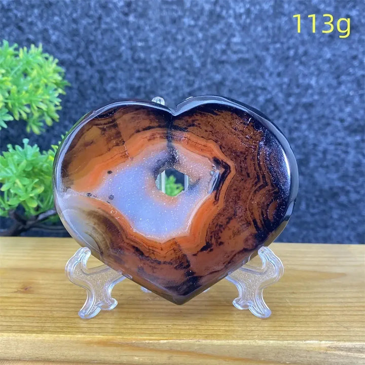 Heart-shaped black and red agate crystal geode, 113g, for home decor and reiki healing.