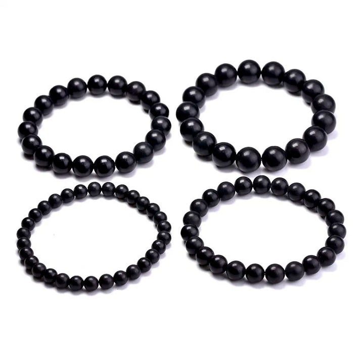 Shungite Bead Bracelet: four black bead bracelets in different bead sizes on white