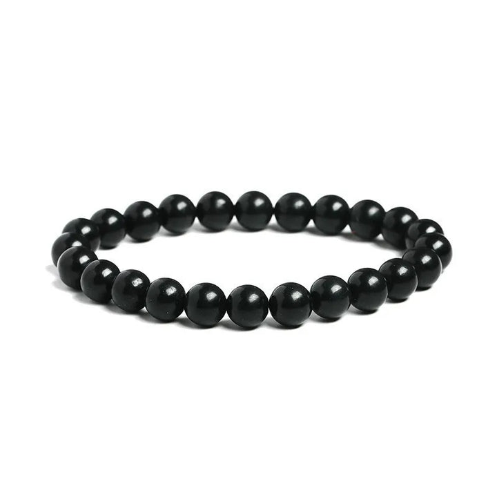Shungite Bead Bracelet: side view of the black stretch bracelet on white